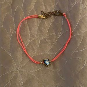 Pink bracelet with star charm